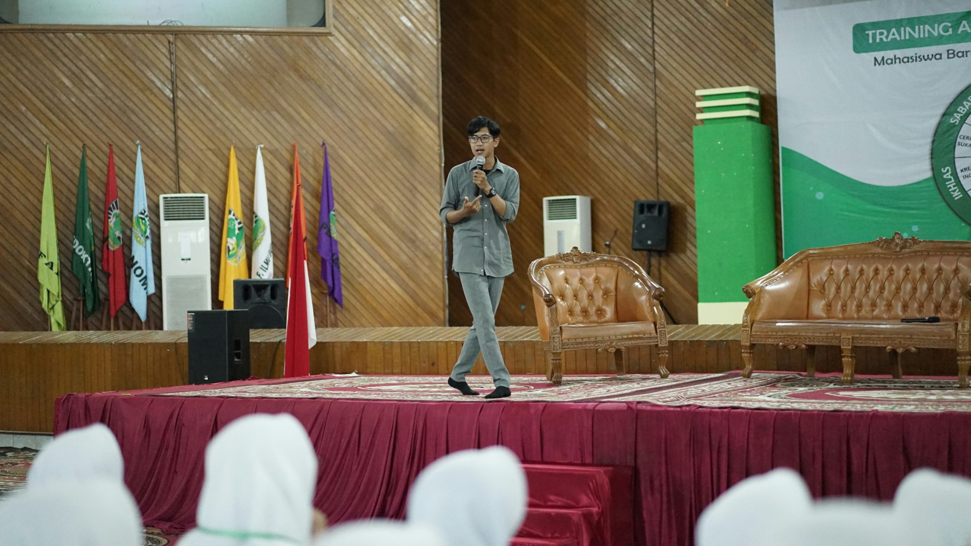 a person standing on a stage